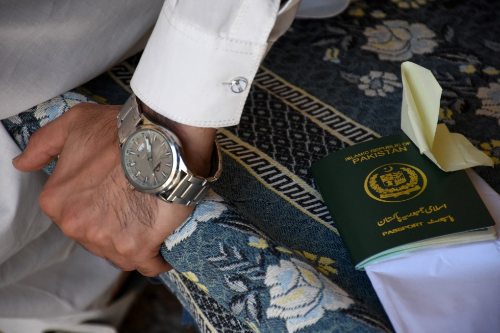 A Pakistani Shi’ite Muslim man, who was working as a building security officer in the UAE, speaks with reporters in his village after being deported along with many others following the US-Israeli war against Iran, in Chakwal, Pakistan on May 5. Photo: Reuters