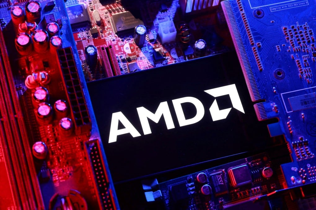 An AMD logo and a computer motherboard appear in this illustration. Image: Reuters