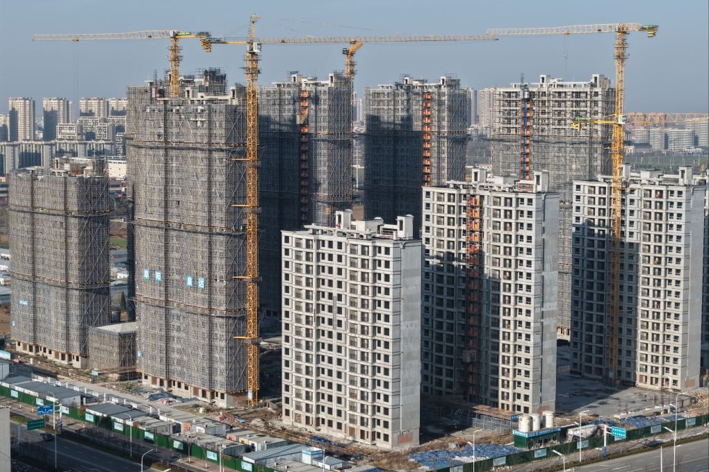 Residential buildings under construction in Fuyang, Anhui province, in December. Photo: Costfoto/NurPhoto via Getty Images