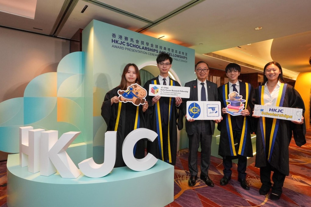 Hong Kong Jockey Club chairman Martin Liao (centre) with JC Scholars Winnie Pang (first left), Sunny Wong (second right) and Samantha Yeung (first right), and JC STEM Early Career Research Fellowship recipient Dr Jeff Lam (second left).