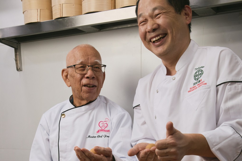 Dim sum chef Foo Shing (left) shares a laugh with Cheung Yat-sing, global product innovation director at Tim Ho Wan. The Hong Kong dim sum restaurant chain has launched a nostalgic dim sum series based on Foo’s recipes. Photo: Tim Ho Wan
