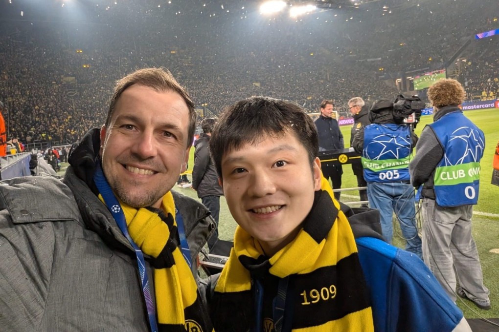 Timo Boll and Fan Zhendong attend a Champions League football match in Dortmund. Photo: Timo Boll