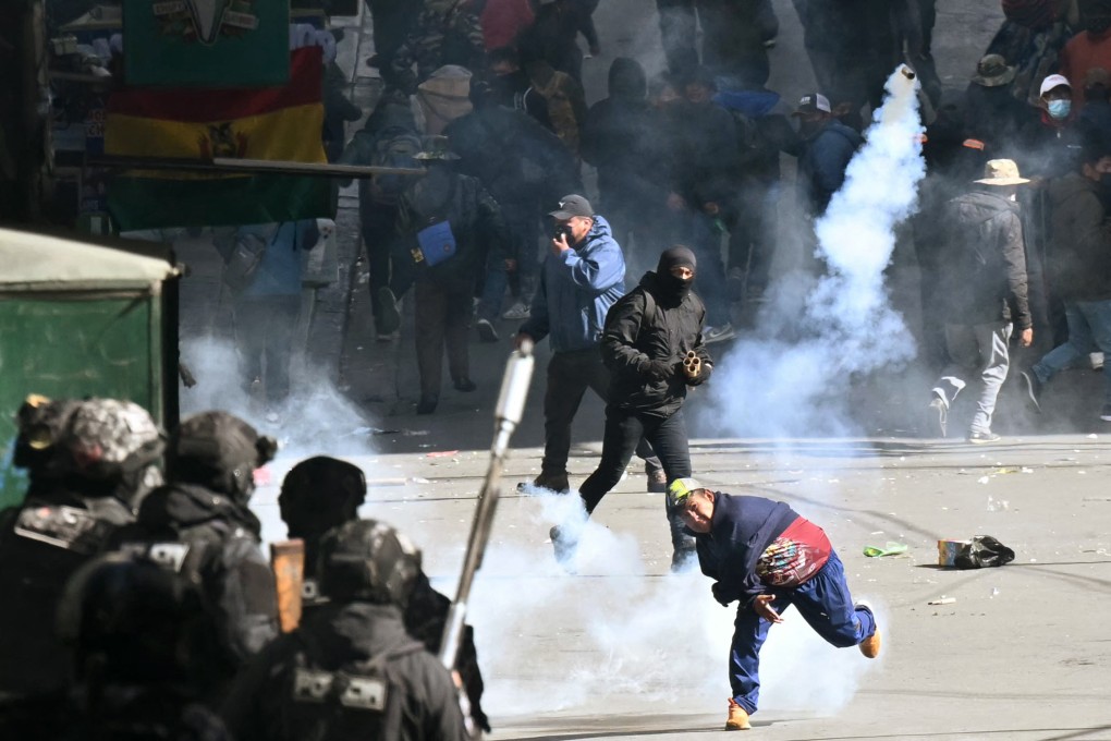 Demonstrators clash with anti-riot police during a rally against President Rodrigo Paz in La Paz, Bolivia on Monday. Photo: AFP