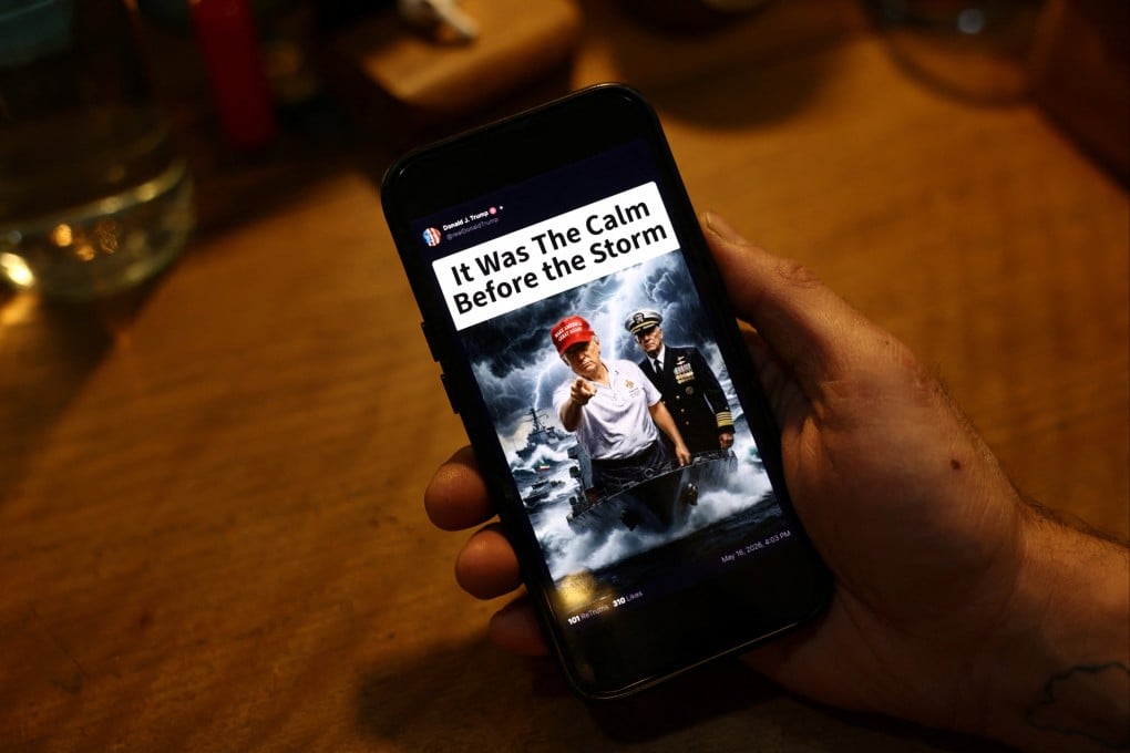 An Iranian man in Tehran looks at a social media post by US President Donald Trump. Photo: West Asia News Agency via Reuters