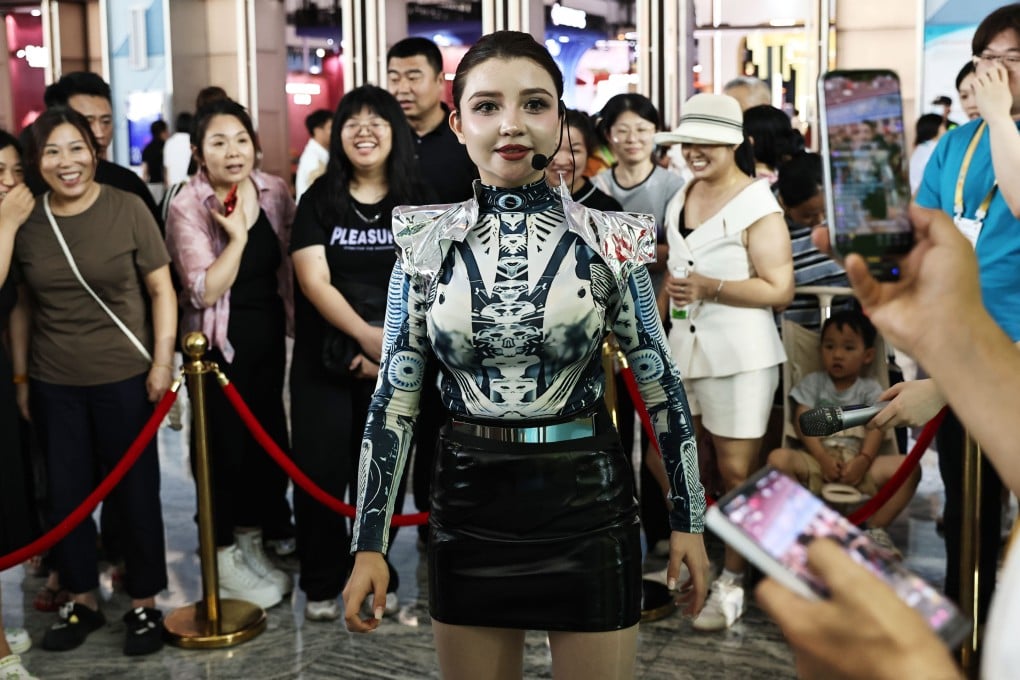 An AI humanoid robot interacts with visitors at a business expo in China’s southern Hainan province. Photo: Xinhua