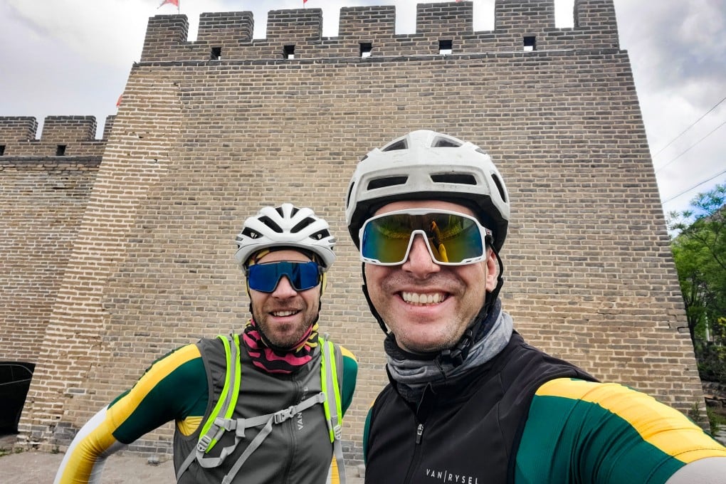 Benjamin Schuessler (left) and Sean Gallagher stop for a photo outside the walled town of Jimingyi, an important garrison for the Great Wall, in Hebei province. Photo: Sean Gallagher