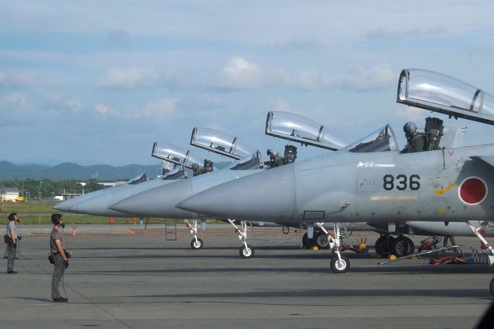 F-15J Eagle fighter aircraft of the Japan Air Self-Defence Force prepare for take-off at Chitose Air Base, Hokkaido prefecture, in 2017. Photo: AFP