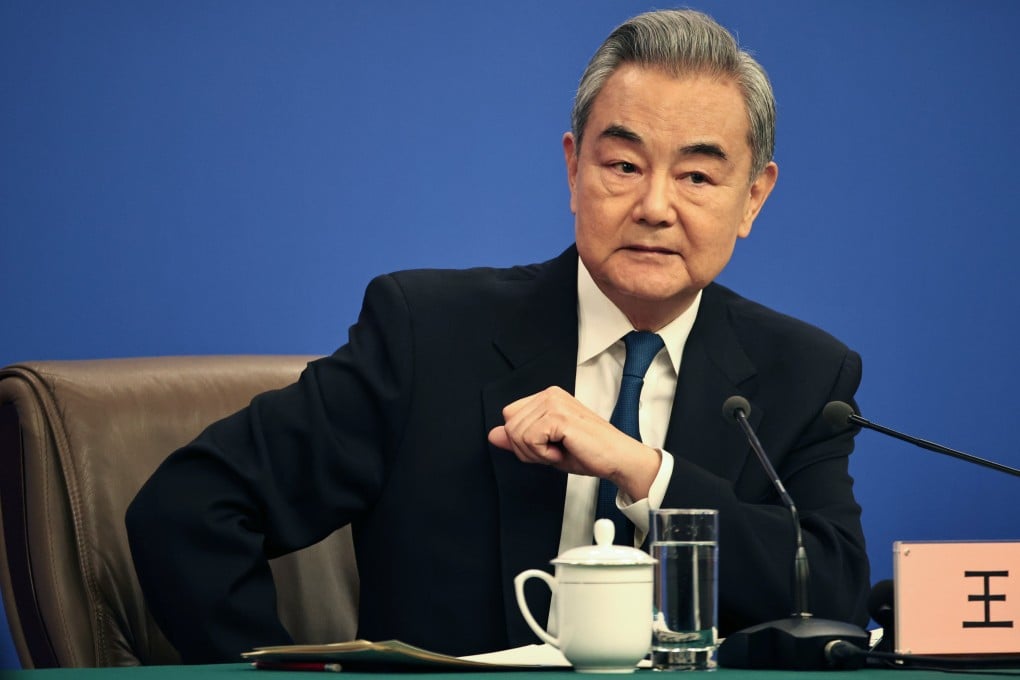 Chinese Foreign Minister Wang Yi listens to a question during a press conference on during the fourth session of the 14th National People’s Congress in Beijing, on March 8. Photo: EPA