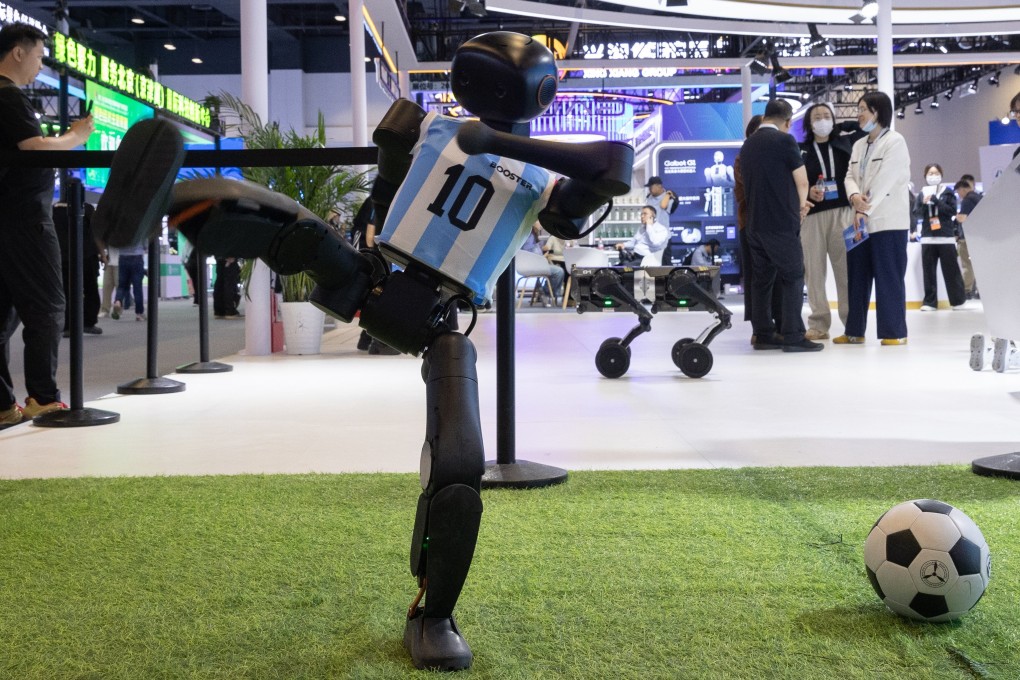 A robot demonstrates its kicking ability at the 28th China Beijing International High-Tech Expo (CHITEC) in Beijing on May 8. Photo: EPA