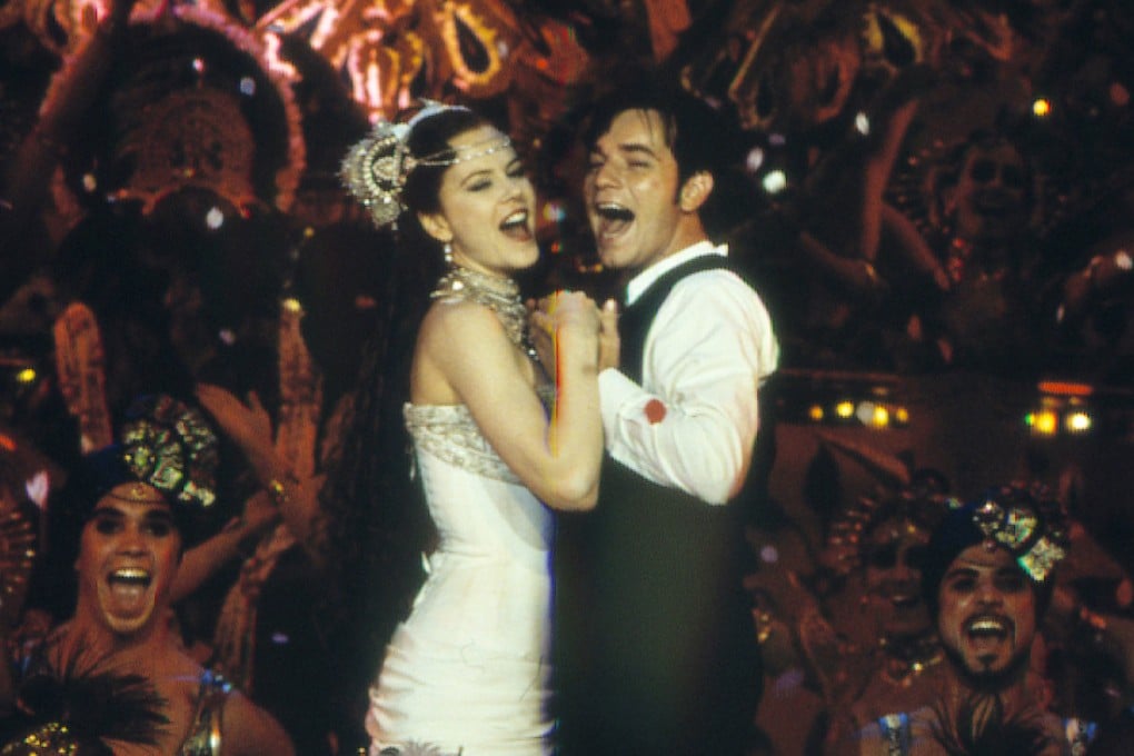 Nicole Kidman and Ewan McGregor in a still from Moulin Rouge (2001), directed by Baz Luhrmann. The film is the final part of Luhrmann’s Red Curtain Trilogy, following Strictly Ballroom (1992) and Romeo + Juliet (1996).