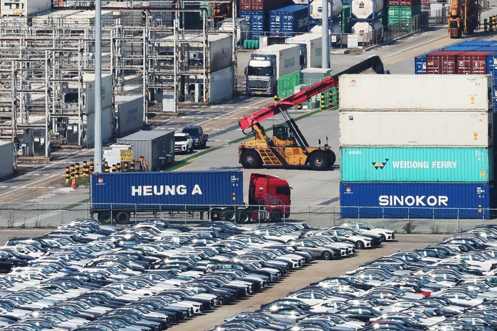 Containers awaiting export stacked at a pier in Pyeongtaek, South Korea. The Bank of Korea has raised the country’s 2026 GDP growth forecast to 2.6 per cent. Photo: EPA