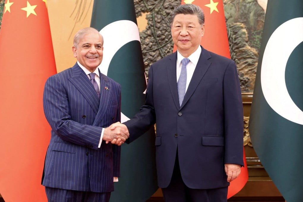 Pakistani Prime Minister Shehbaz Sharif shakes hands with President Xi Jinping at the Great Hall of the People in Beijing on May 25. Photo: Reuters