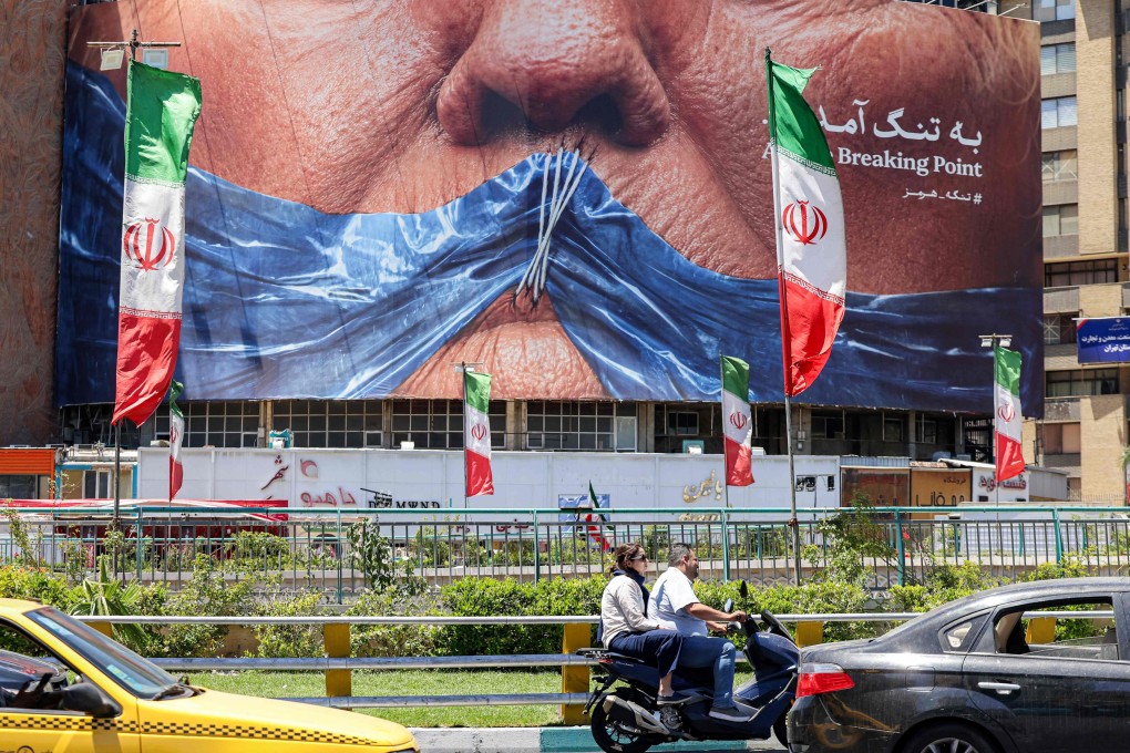 An anti-US billboard in Tehran depicting US President Donald Trump and the Strait of Hormuz. Photo: AFP