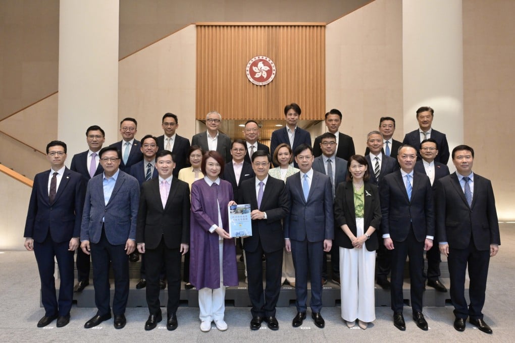 Chief Executive John Lee (front row, centre) and other officials met lawmakers on Friday morning to discuss the report. Photo: Handout
