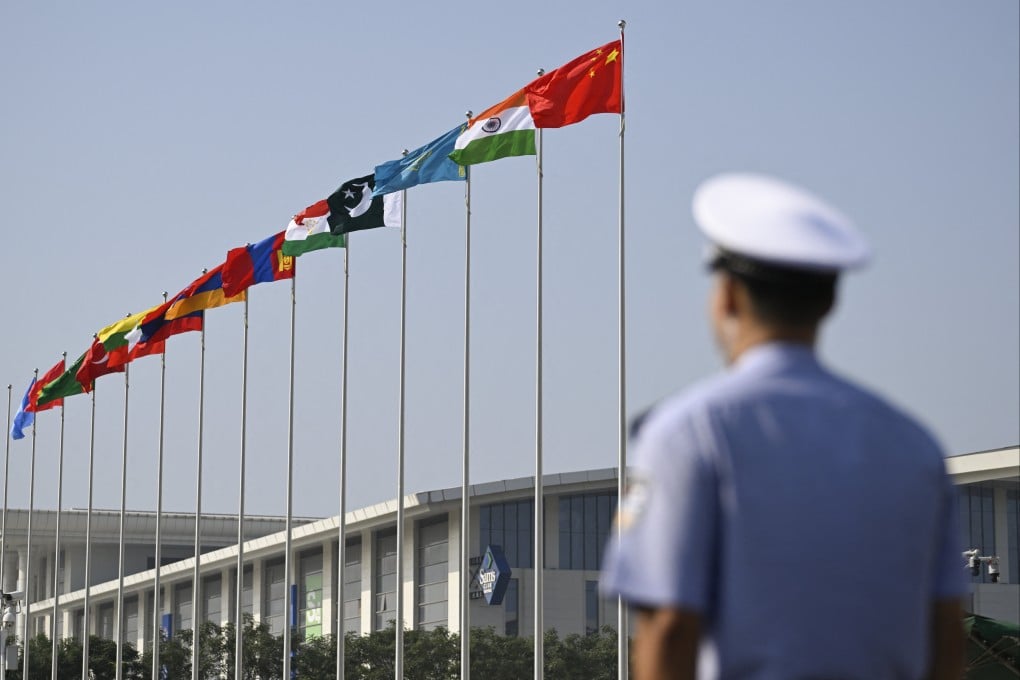 Flags wave outside the Tianjin Meijiang Convention and Exhibition Centre during the Shanghai Cooperation Organisation (SCO) Summit in Tianjin on September 1. Photo: AFP
