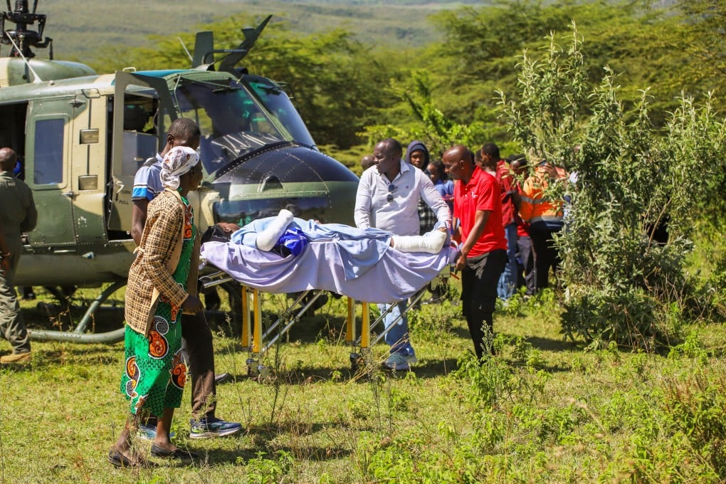 A person is taken out of a Kenyan Air Force aircraft at St Joseph Hospital after a fire at Utumishi Girls School in Kenya’s Gilgil area on Thursday. Photo: AP