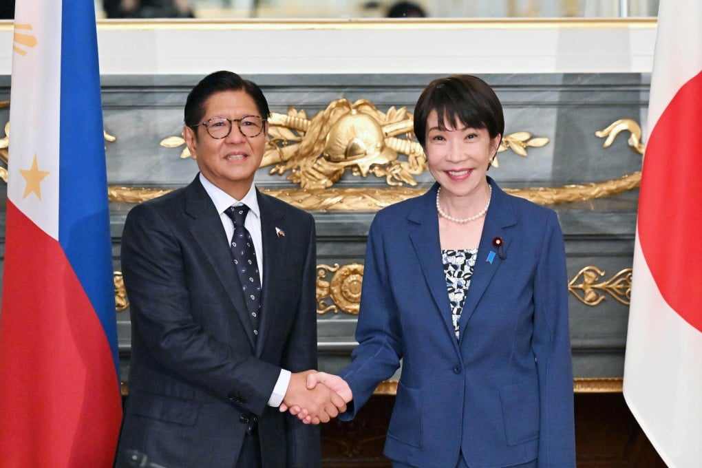 Japanese Prime Minister Sanae Takaichi (right) and Philippine President Ferdinand Marcos Jnr (left) shake hands before talks in Tokyo on May 28, 2026. Photo: Kyodo
