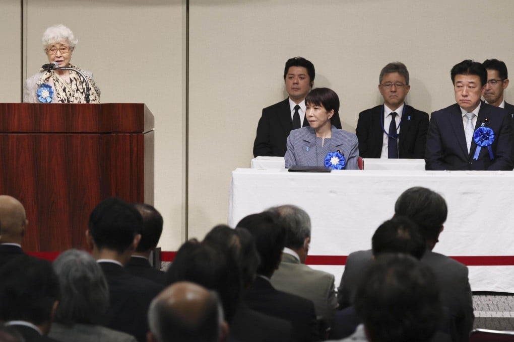 Sakie Yokota (left), whose daughter Megumi was abducted by North Korea in 1977 at age 13, speaks at a rally on the abduction issue in Tokyo on May 30, 2026, where Prime Minister Sanae Takaichi (front row, middle) also attended. Photo: Kyodo