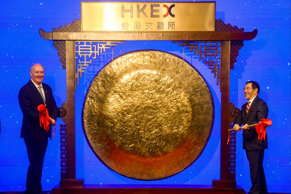 Cathay Group Chair Guy Bradley (left) and Hong Kong Exchanges and Clearing (HKEX) Chairman Carlson Tong Ka-shing (right) prepare to ring the gong to mark 40 years of HKEX on May 28, 2026. Photo: Jonathan Wong