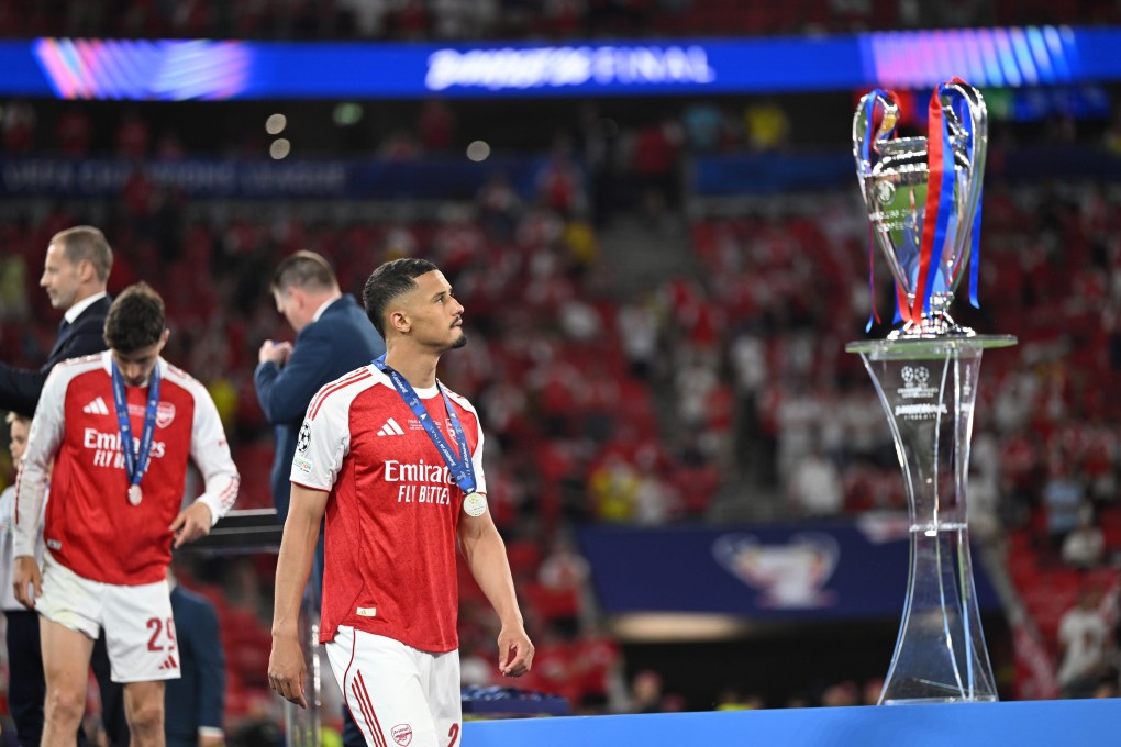 William Saliba wistfully gazes at the Champions League trophy that again evaded Arsenal. Photo: Xinhua