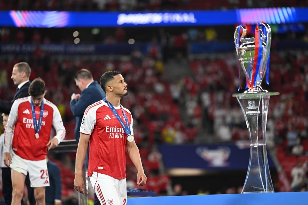 William Saliba wistfully gazes at the Champions League trophy that again evaded Arsenal. Photo: Xinhua