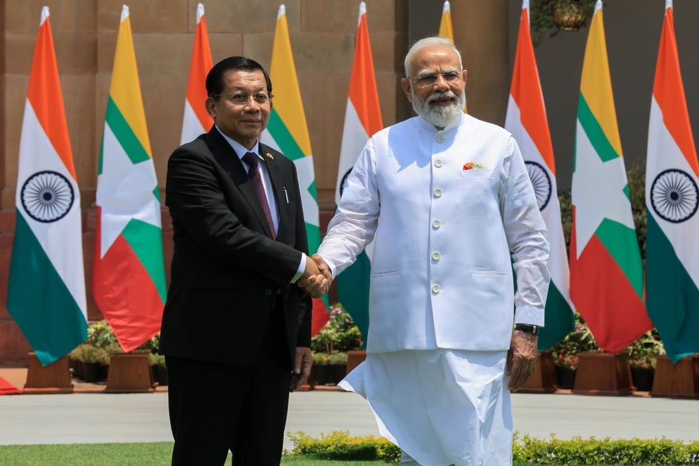 Indian Prime Minister of India Narendra Modi (right) shakes hands with Myanmar President Min Aung Hlaing before their meeting at Hyderabad House in New Delhi, India, on Monday. Photo: EPA