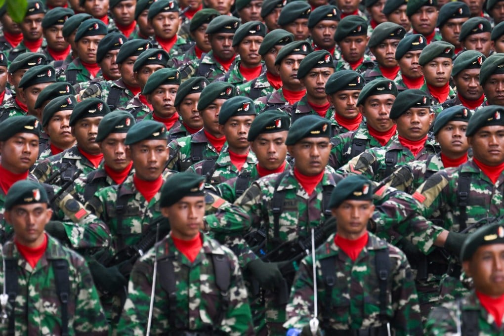 Indonesian National Armed Forces (TNI) personnel march during anniversary celebrations in Banda Aceh in 2024. Photo: AFP