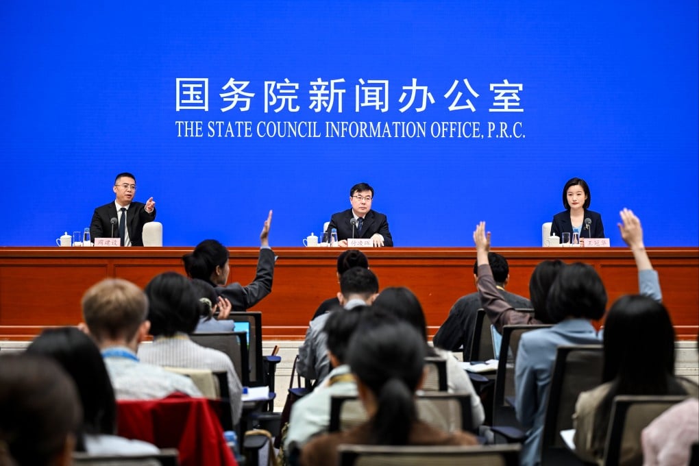 The State Council Information Office holding a press conference in April in Beijing. Photo: Xinhua