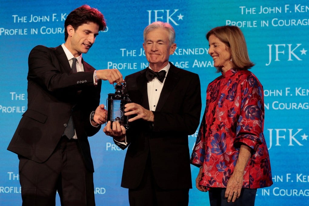 Caroline Kennedy and her son, Jack Schlossberg, present the 2026 John F. Kennedy Profile in Courage Award to Jerome Powell. Photo: Reuters