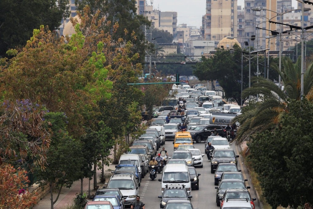 Traffic clogs an exit route as residents flee the southern suburbs of Beirut on Monday. Photo: Reuters