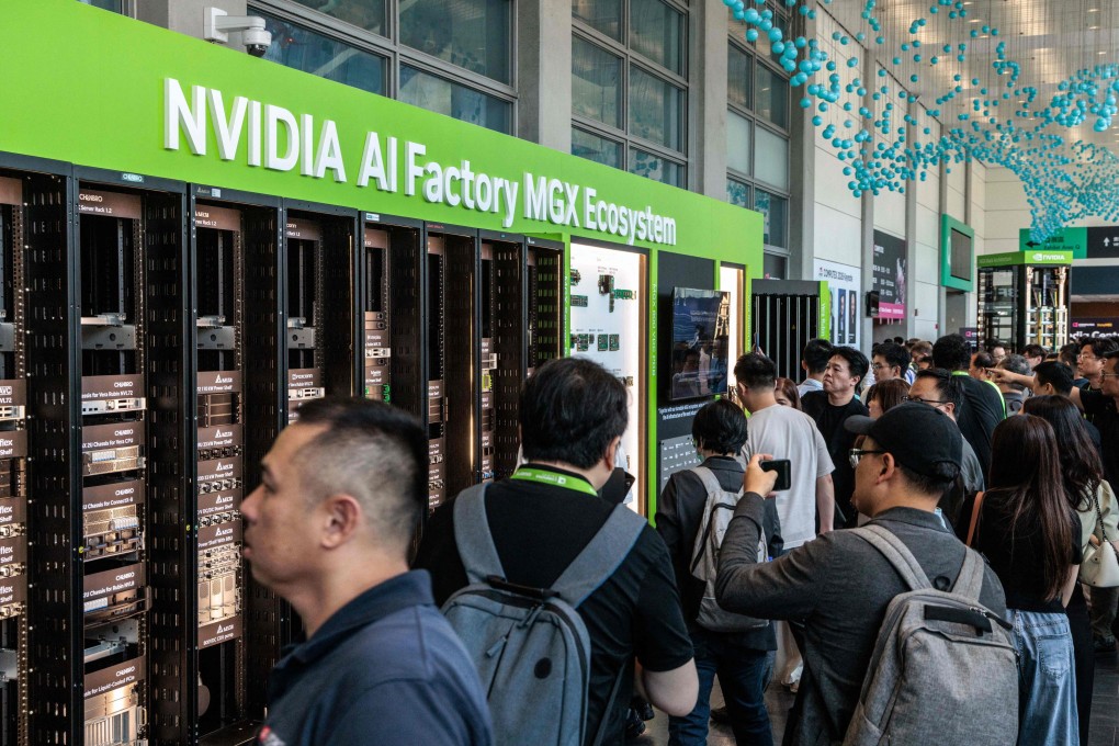 Visitors view Nvidia’s AI Factory MGX Ecosystem display during Computex in Taipei on Tuesday. Photo: AFP
