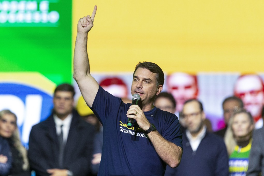 Brazilian senator and presidential hopeful Flavio Bolsonaro speaks during a political rally in Curitiba, Brazil, on Friday. Photo: EPA