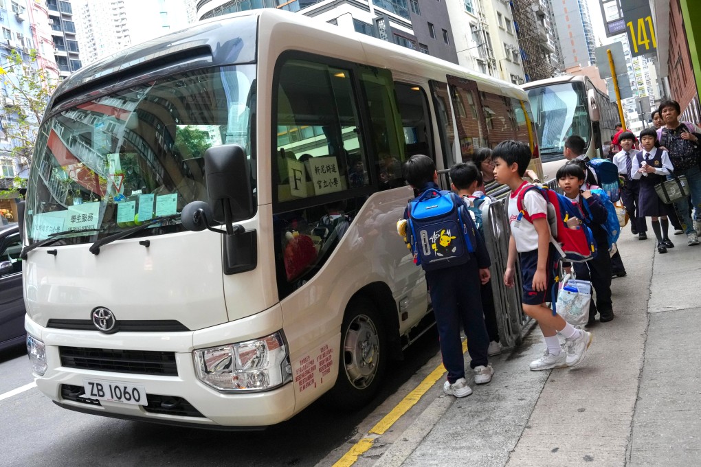 A school bus picks up pupils outside the Hennessy Road Government Primary School in Wan Chai on April 9. Photo: Jelly Tse