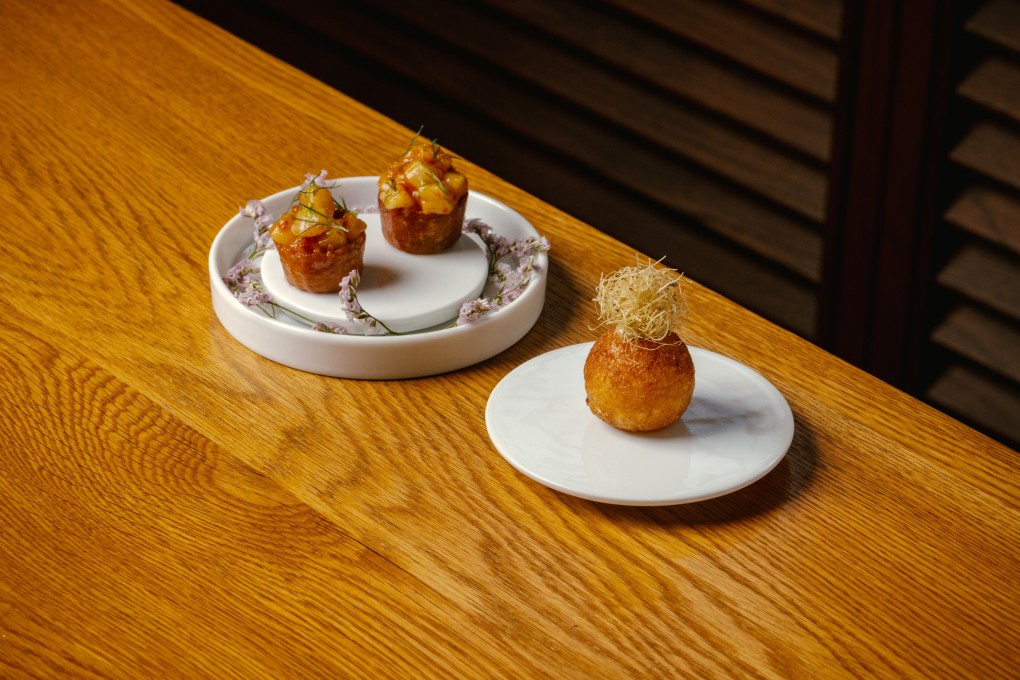 Scallop Pie Tee & Crab Bao at Whey. Photo: Handout