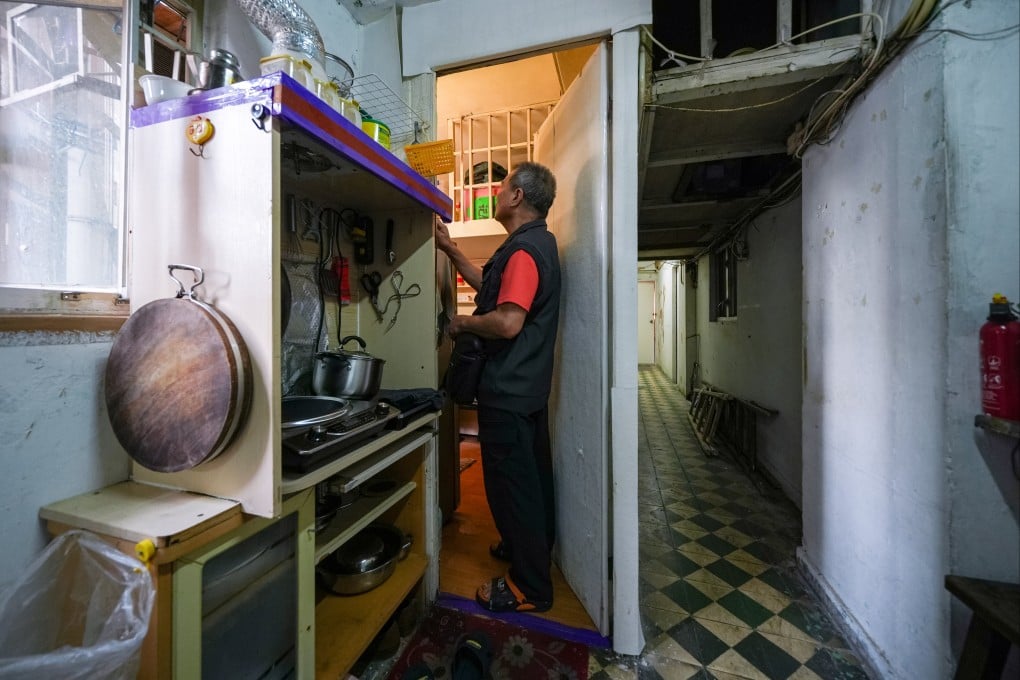 A tenant surnamed Chan inside his subdivided flat at Yee Wa Building in Cheung Sha Wan. Photo: Eugene Lee