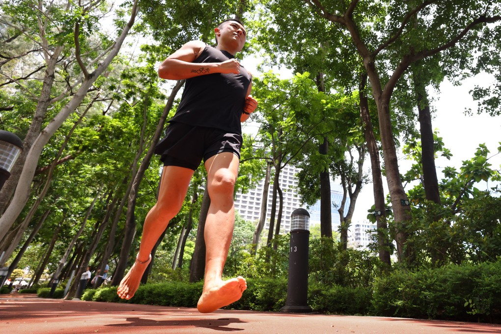Barefoot marathoner and Hyrox competitor Leo Chan runs shoeless in Hong Kong’s Victoria Park on May 13, 2026. Photo: Dickson Lee