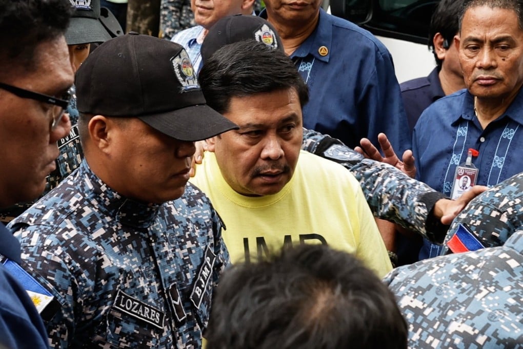 Arrested Philippines Senator Jinggoy Estrada (C) arrives for a scheduled court arraignment at the Sandiganbayan anti-graft court in Quezon City, Metro Manila, Philippines, on Tuesday. Photo: EPA