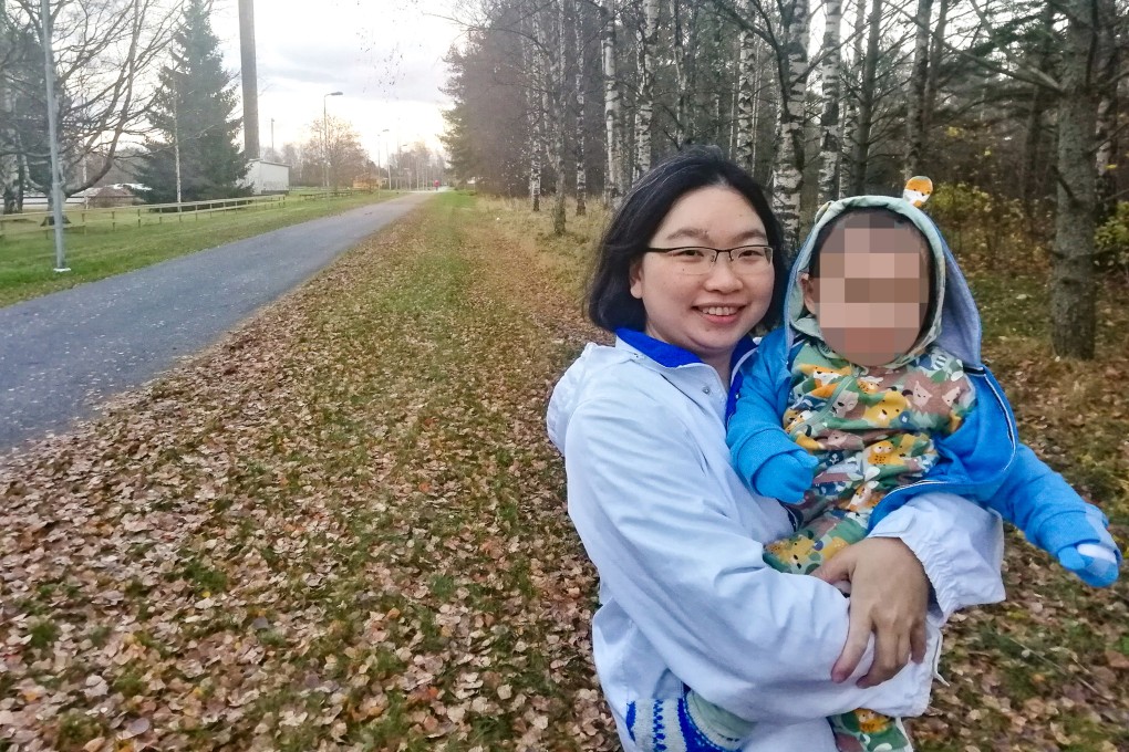 Kwan Pui-sin with Lily, who was born in Finland and is currently in the care of Swedish authorities. Photo: Handout