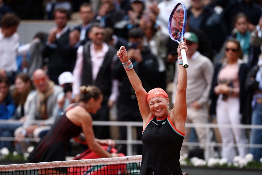 Russia’s Diana Shnaider celebrates after winning her quarter-final match against Belarus’ Aryna Sabalenka (in background). Photo: Reuters