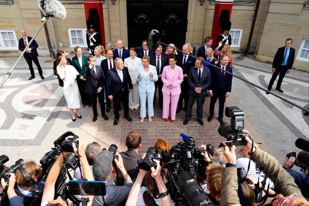 (First row, from left) Denmark’s Foreign Minister Lars Loekke Rasmussen of the Moderates party, Denmark’s Prime Minister Mette Frederiksen of the Social Democrats party, Pia Olsen Dyhr of the Socialist People’s Party and Martin Lidegaard of Denmark’s The Social Liberal Party address the media outside Amalienborg Castle in Copenhagen on Wednesday. Photo: AFP