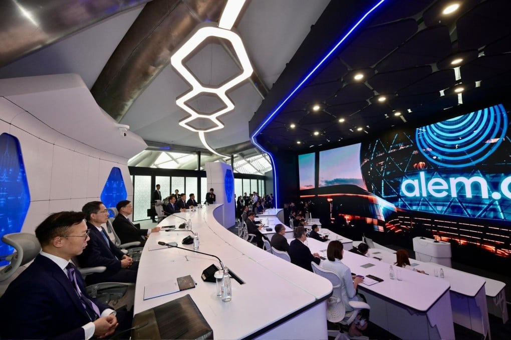 Chief Executive John Lee and delegation members learn about Kazakhstan’s AI developments during their visit. Photo: handout