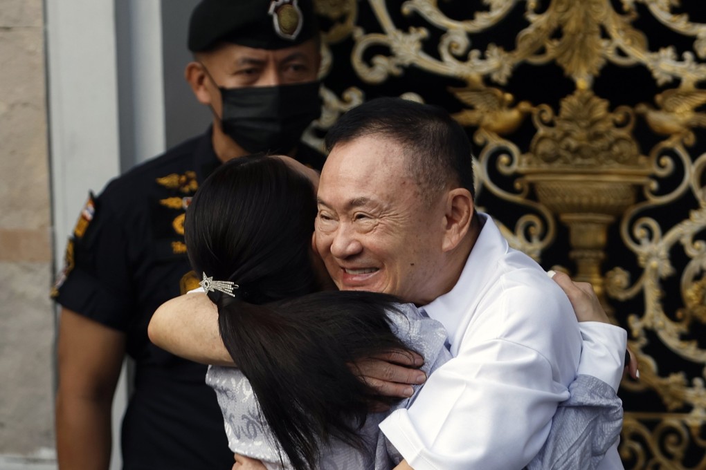 Ex-Thai prime minister Thaksin Shinawatra hugs his daughter and former prime minister Paetongtarn Shinawatra after being released from prison on parole at Klong Prem Central Prison in Bangkok last month. Photo: EPA