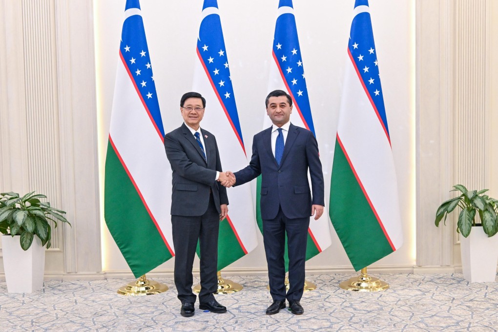 Hong Kong Chief Executive John Lee alongside Uzbekistan’s Foreign Affairs Minister, Bakhtiyor Saidov. Photo: Handout