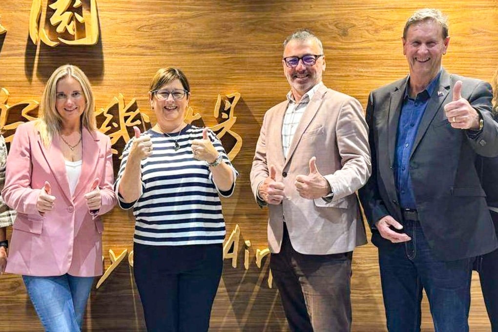New Zealand MPs (from left to right) Laura McClure, Maureen Pugh, Duncan Webb and David Wilson posing for a group photo at the airport in Taoyuan. Photo: AFP