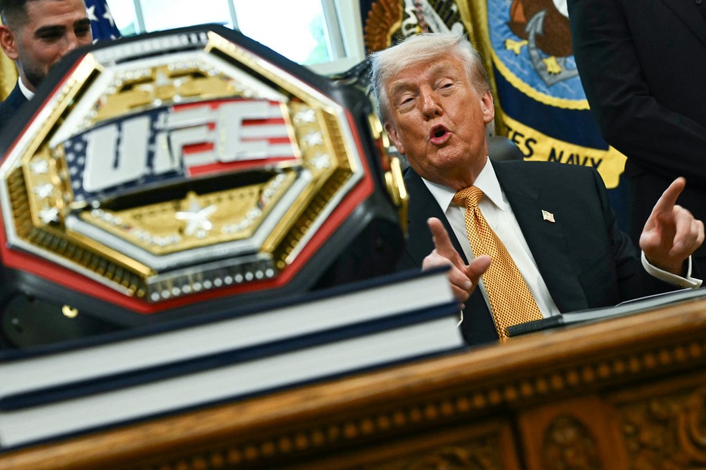 A UFC championship belt is displayed as US President Donald Trump speaks in the Oval Office in May. Photo: AFP/TNS