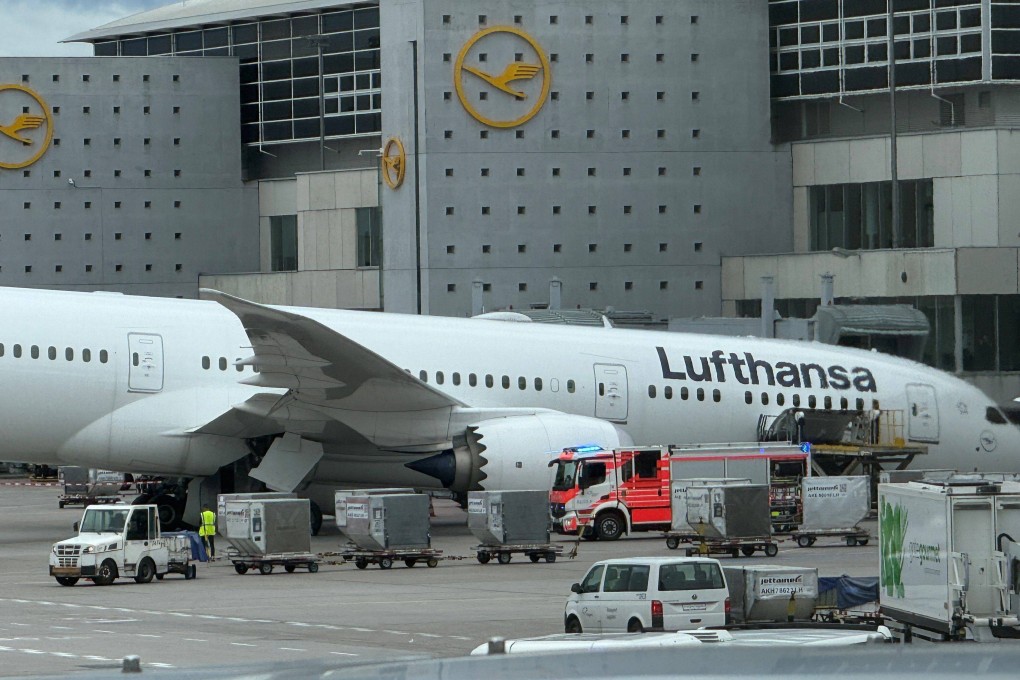 The Lufthansa Dreamliner resting on its nose at a Frankfurt airport gate. Photo: dpa