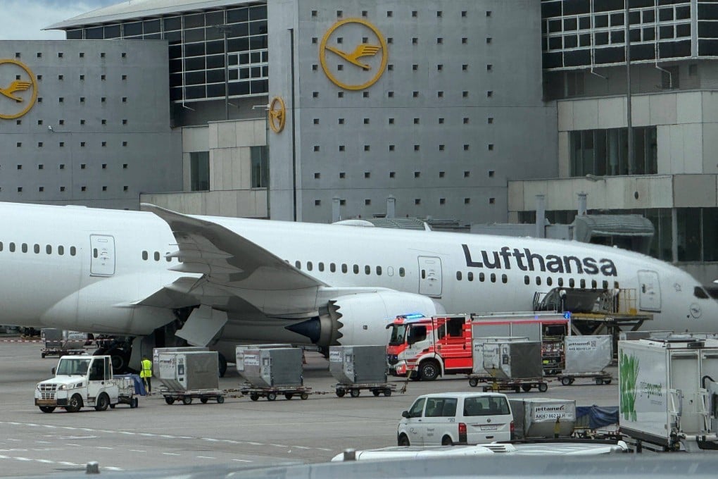 The Lufthansa Dreamliner resting on its nose at a Frankfurt airport gate. Photo: dpa