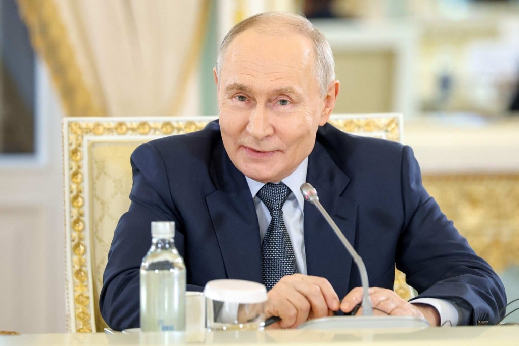 Russia’s President Vladimir Putin meets with representatives of international news agencies on the sidelines of the St Petersburg International Economic Forum on Thursday. Photo: AFP