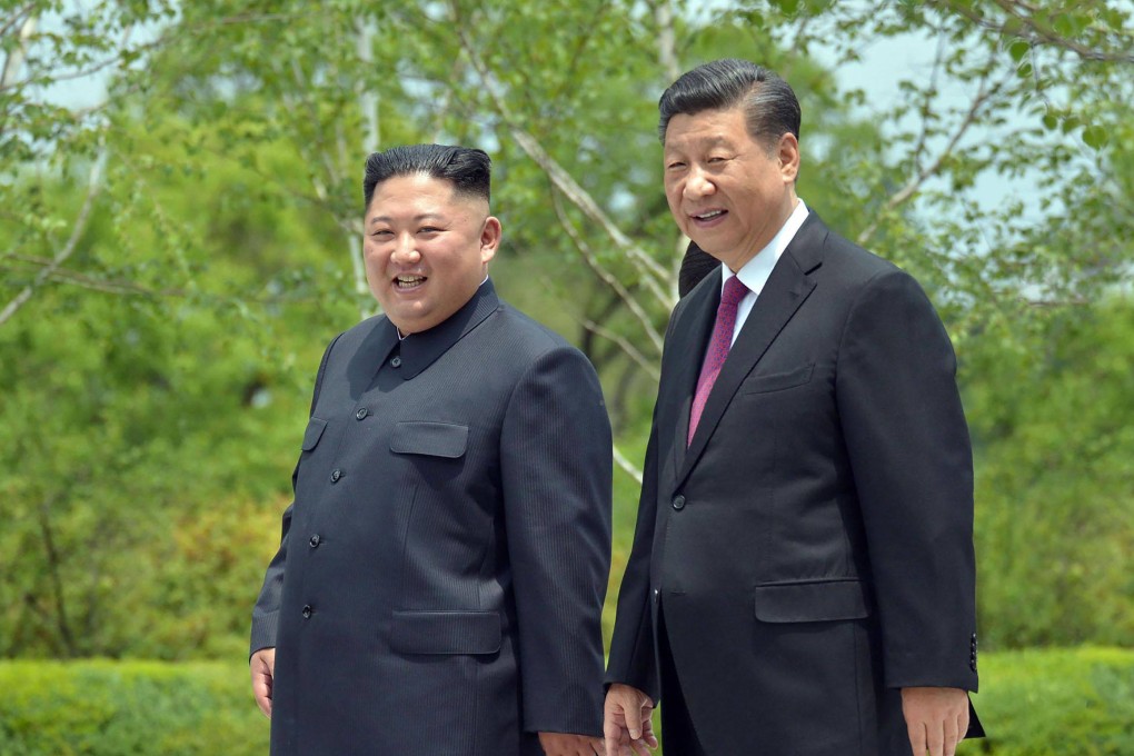 North Korean leader Kim Jong Un (left) and Chinese President Xi Jinping in Pyongyang in 2019. Photo: AFP