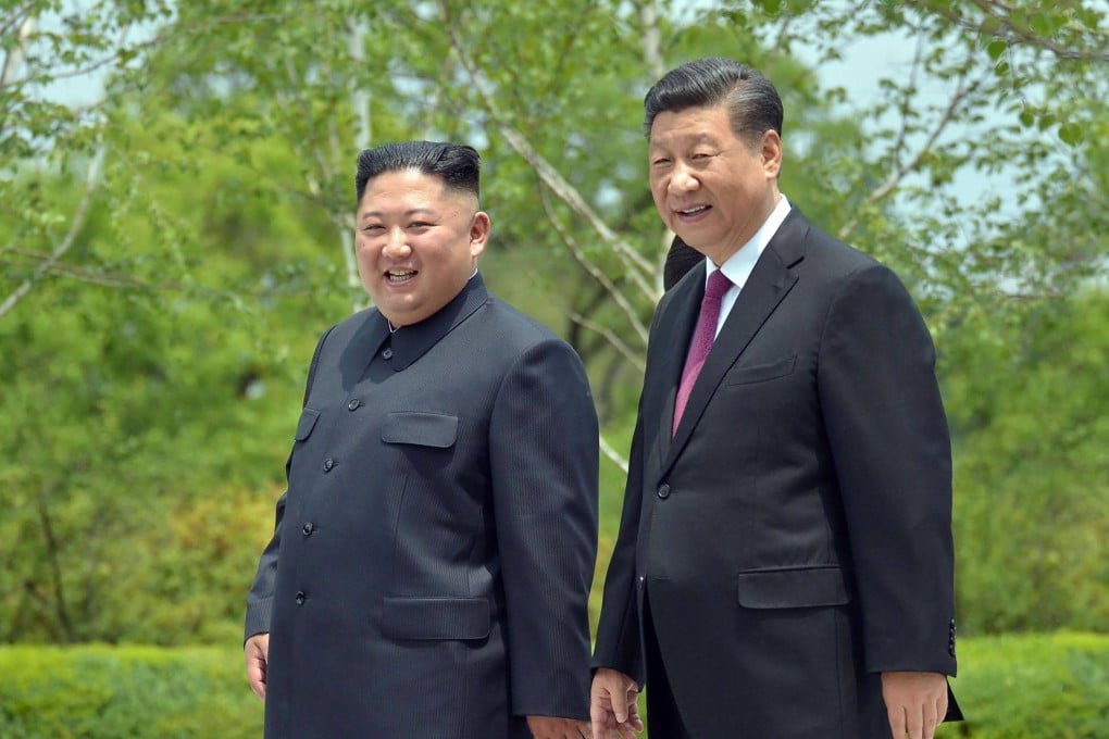 North Korean leader Kim Jong Un (left) and Chinese President Xi Jinping in Pyongyang in 2019. Photo: AFP